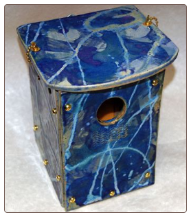 handcrafted stoneware blue bird house