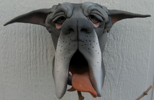 Great Dane ceramic makes for a most unique birdhouse