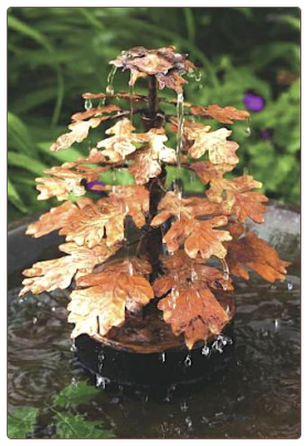 a copper leaf birdbath dripper and fountain provides a soothing sight and sound