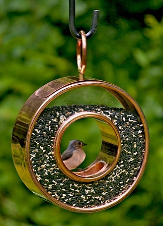 copper and glass bird feeder is quite groovy