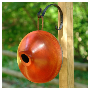 these hand crafted wood birdhouses are made from mango trees