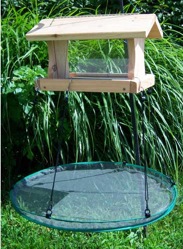 Use seed catchers to prevent ground waste and unwanted visitors