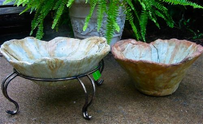 unique textured birdbath with matching planter is handcrafted from 60% recycled materials