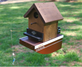 The wooden boathouse is ceratinly a unique birdhouse, and it's totally functional too.