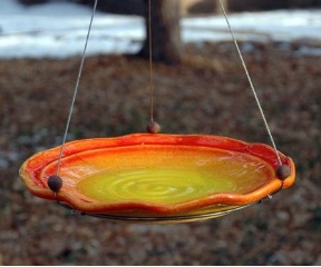 Artsy hanging bird bath in weather-proof stoneware and vibrant colors, 