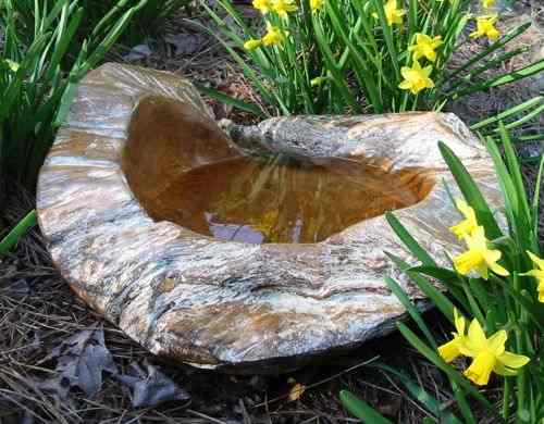 unusual teak bird baths may be set on the ground, deck, or raised using a planter or metal base