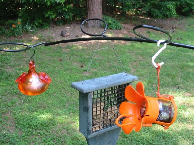 Groovy bird feeder bracket lets you expand an existing garden pole