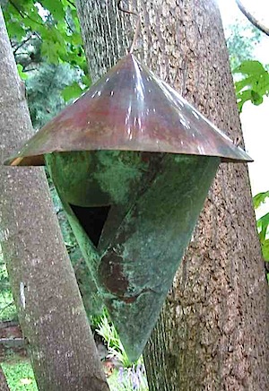 unique birdhouse in aged copper with mod design