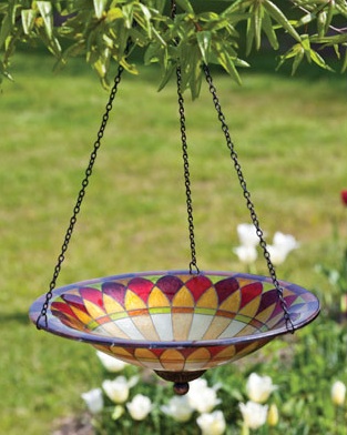 Even the smallest deck or balcony can entice birds with a hanging bird bath