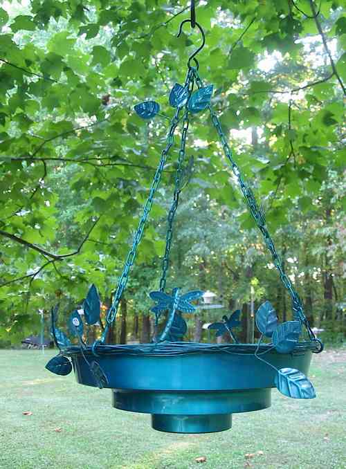 This hanging bird bath will work great in the large tree.