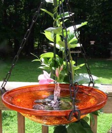 solar bubbler brings a hanging birdbath to life