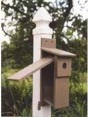 Easy blue bird house nest checks with a side door that opens