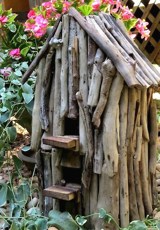 unique birdhouse crafted from driftwood