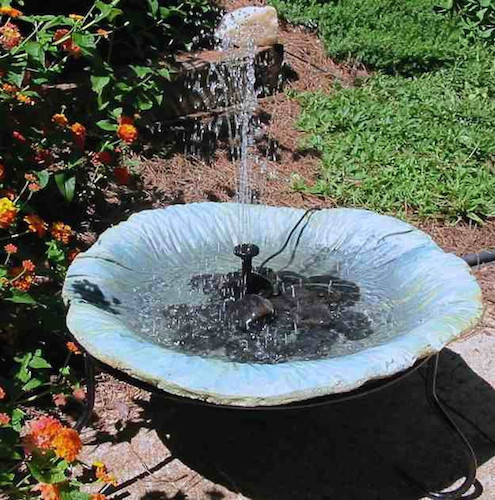 Heater removed from bird bath with solar fountain added for spring